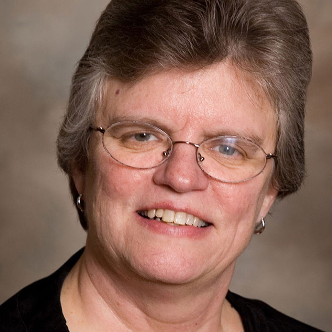 Headshot of Miller.