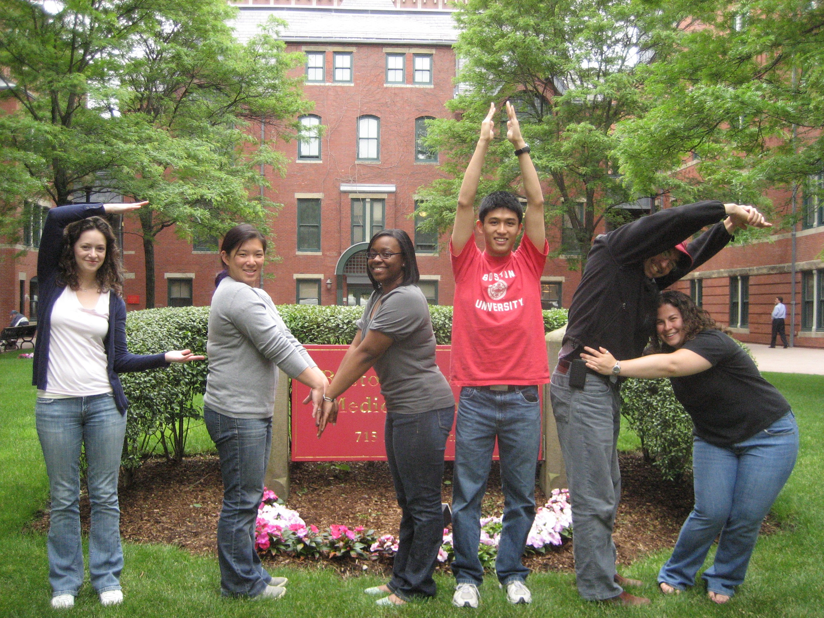 Members of the Boston FMIG spelling out / Members of the Boston FMIG spelling out
